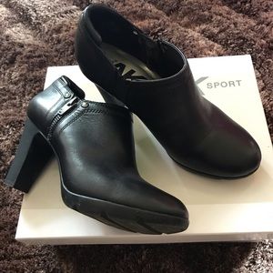 Black zip up ankle boots.